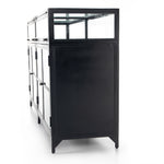 Featuring Shadow Box Sideboard - Black by Four Hands at Amethyst Home. This Shadow Box Sideboard gives your inner collector a place to play. Store prized possessions behind clear glass fronts, with black-finished metal casing and brass hardware for contrast.
Overall Dimensions: 70"W x 17.25"L x 35"H
Colors: Black, Weathered Bronze, Clear Glass, Tempered .  Amethyst Home provides interior design, new home construction design consulting, vintage area rugs, and lighting in the Los Angeles metro area.