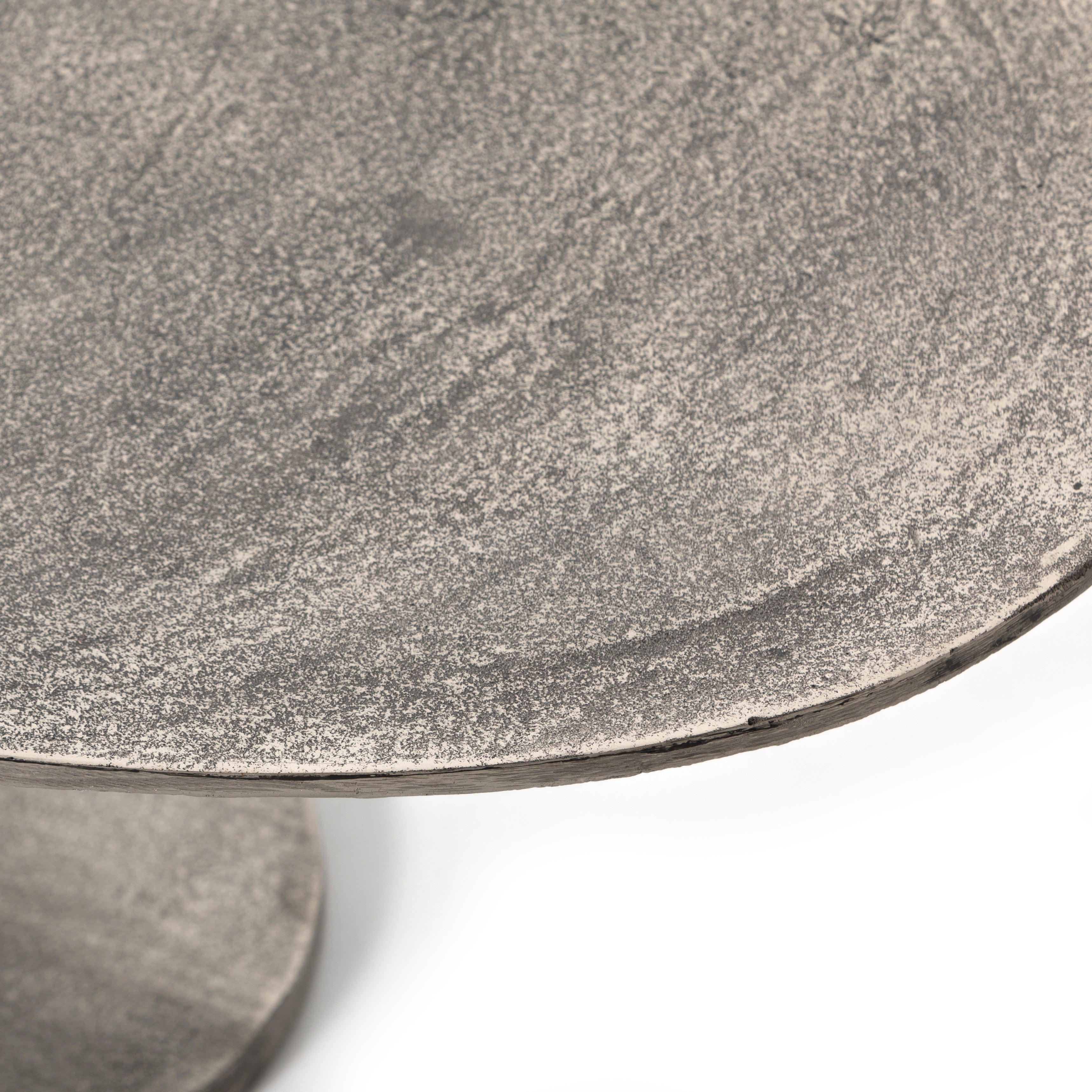 Featuring Simone Coffee Table - Antique Nickel by Four Hands at Amethyst Home. We love the oval shape of this Simone Coffee Table - Antique Nickel. The textural cast aluminum makes for a beautifully modern coffee table, with alluring highs and lows played up by a raw nickel finish.  Great indoors or out; cover or store indoors during inclement weather an.  Amethyst Home provides interior design, new home construction design consulting, vintage area rugs, and lighting in the Kansas City metro area.