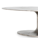 Featuring Simone Coffee Table - Antique Nickel by Four Hands at Amethyst Home. We love the oval shape of this Simone Coffee Table - Antique Nickel. The textural cast aluminum makes for a beautifully modern coffee table, with alluring highs and lows played up by a raw nickel finish.  Great indoors or out; cover or store indoors during inclement weather and .  Amethyst Home provides interior design, new home construction design consulting, vintage area rugs, and lighting in the Nashville metro area.