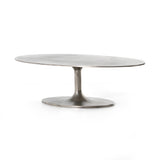 Featuring Simone Coffee Table - Antique Nickel by Four Hands at Amethyst Home. We love the oval shape of this Simone Coffee Table - Antique Nickel. The textural cast aluminum makes for a beautifully modern coffee table, with alluring highs and lows played up by a raw nickel finish.  Great indoors or out; cover or store indoors during inclement weather and.  Amethyst Home provides interior design, new home construction design consulting, vintage area rugs, and lighting in the Alpharetta metro area.