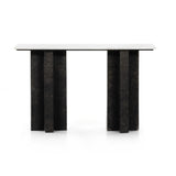 Featuring Terrell Console Table - Raw Black by Four Hands at Amethyst Home. Finished in a raw black, uniquely angular cast aluminum legs, this Terrell Console Table - Raw Black showcases a rectangular tabletop of solid marble in a clean, polished white. We'd love to see this in an entryway or behind a sofa. 
Overall Dimensions: 51"W x 17"L x 31.25"H
Colors:.  Amethyst Home provides interior design, new home construction design consulting, vintage area rugs, and lighting in the Portland metro area.