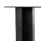 Featuring Terrell Console Table - Raw Black by Four Hands at Amethyst Home. Finished in a raw black, uniquely angular cast aluminum legs, this Terrell Console Table - Raw Black showcases a rectangular tabletop of solid marble in a clean, polished white. We'd love to see this in an entryway or behind a sofa. 
Overall Dimensions: 51"W x 17"L x 31.25"H
Colors: Ra.  Amethyst Home provides interior design, new home construction design consulting, vintage area rugs, and lighting in the Omaha metro area.