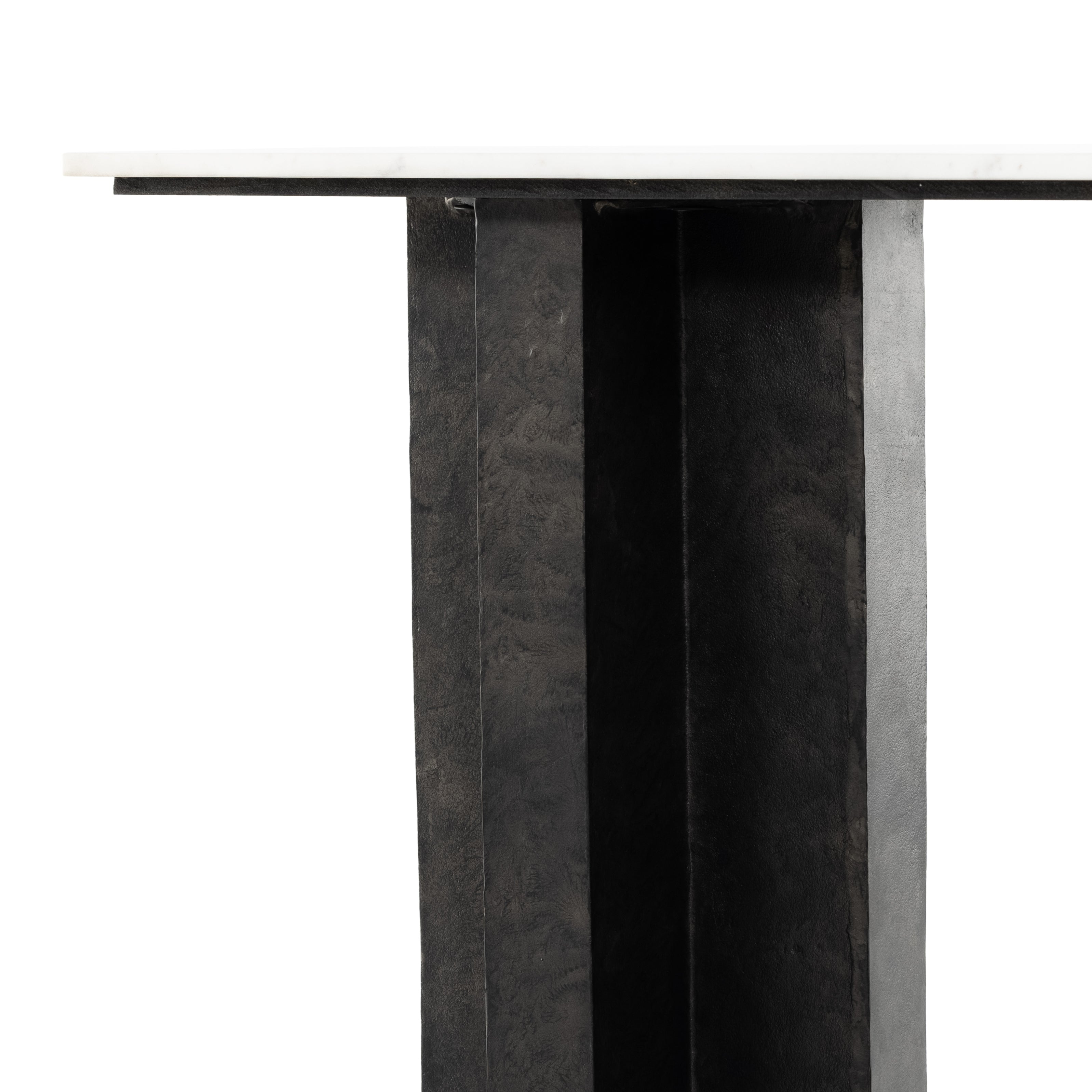 Featuring Terrell Console Table - Raw Black by Four Hands at Amethyst Home. Finished in a raw black, uniquely angular cast aluminum legs, this Terrell Console Table - Raw Black showcases a rectangular tabletop of solid marble in a clean, polished white. We'd love to see this in an entryway or behind a sofa. 
Overall Dimensions: 51"W x 17"L x 31.25"H
Colors: Ra.  Amethyst Home provides interior design, new home construction design consulting, vintage area rugs, and lighting in the Omaha metro area.