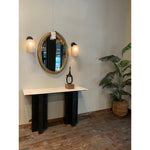 Featuring Terrell Console Table - Raw Black by Four Hands at Amethyst Home. Finished in a raw black, uniquely angular cast aluminum legs, this Terrell Console Table - Raw Black showcases a rectangular tabletop of solid marble in a clean, polished white. We'd love to see this in an entryway or behind a sofa. 
Overall Dimensions: 51"W x 17"L x 31.25"H
Color.  Amethyst Home provides interior design, new home construction design consulting, vintage area rugs, and lighting in the Scottsdale metro area.