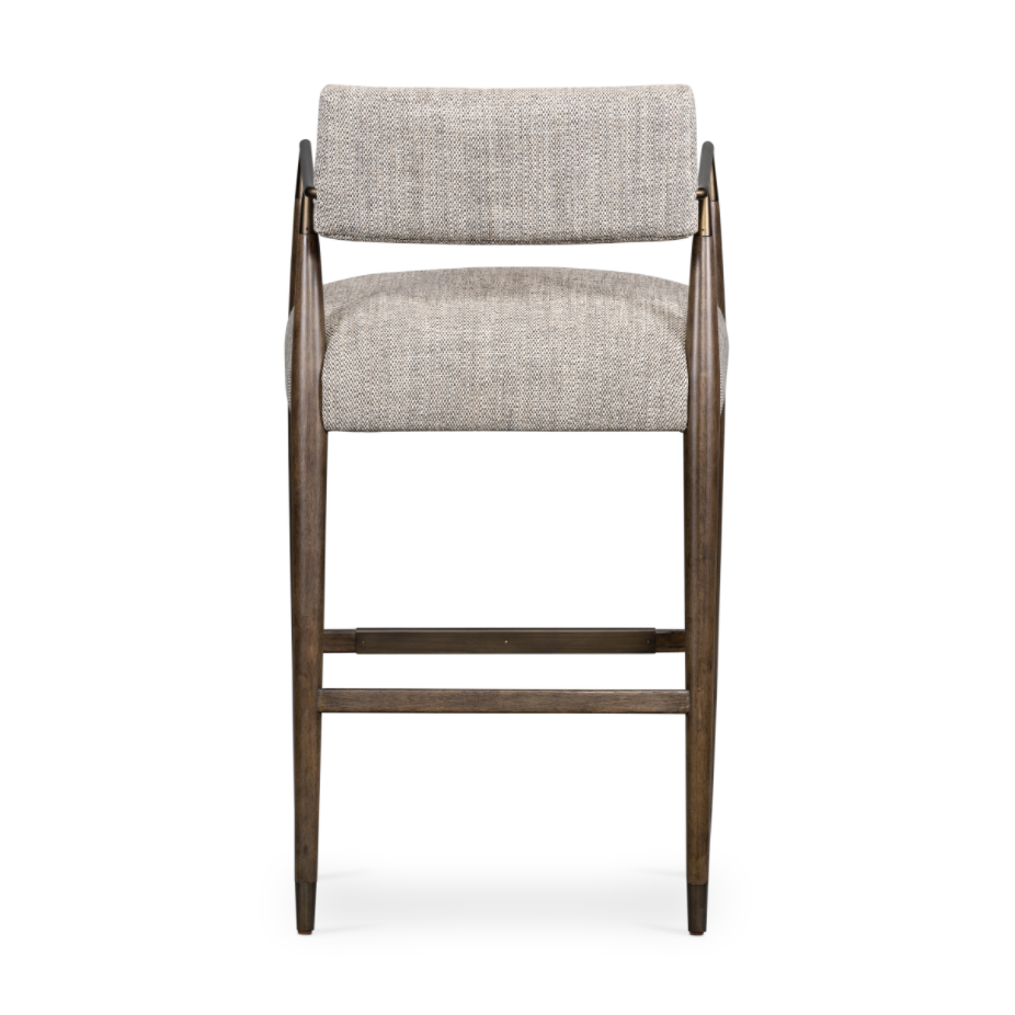 Featuring Waldon Counter Stool by Four Hands at Amethyst Home. Slim, sculptural style with this Waldon Counter Stool. Angular framing features a mix of bronze-finished metal and solid rubberwood, for a forward-thinking feel. Textural linen-blend seating adopts an invitingly neutral grey hue to move freely between spaces and styles.
Size: 23.25"W x 24.50"L .  Amethyst Home provides interior design, new home construction design consulting, vintage area rugs, and lighting in the Calabasas metro area.