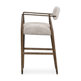 Featuring Waldon Counter Stool by Four Hands at Amethyst Home. Slim, sculptural style with this Waldon Counter Stool. Angular framing features a mix of bronze-finished metal and solid rubberwood, for a forward-thinking feel. Textural linen-blend seating adopts an invitingly neutral grey hue to move freely between spaces and styles.
Size: 23.25"W x 24.50"L .  Amethyst Home provides interior design, new home construction design consulting, vintage area rugs, and lighting in the San Diego metro area.
