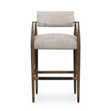 Featuring Waldon Counter Stool by Four Hands at Amethyst Home. Slim, sculptural style with this Waldon Counter Stool. Angular framing features a mix of bronze-finished metal and solid rubberwood, for a forward-thinking feel. Textural linen-blend seating adopts an invitingly neutral grey hue to move freely between spaces and styles.
Size: 23.25"W x 24.5.  Amethyst Home provides interior design, new home construction design consulting, vintage area rugs, and lighting in the Newport Beach metro area.