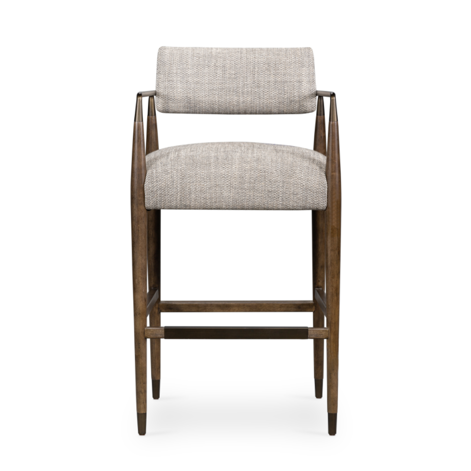 Featuring Waldon Counter Stool by Four Hands at Amethyst Home. Slim, sculptural style with this Waldon Counter Stool. Angular framing features a mix of bronze-finished metal and solid rubberwood, for a forward-thinking feel. Textural linen-blend seating adopts an invitingly neutral grey hue to move freely between spaces and styles.
Size: 23.25"W x 24.5.  Amethyst Home provides interior design, new home construction design consulting, vintage area rugs, and lighting in the Newport Beach metro area.