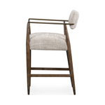 Featuring Waldon Counter Stool by Four Hands at Amethyst Home. Slim, sculptural style with this Waldon Counter Stool. Angular framing features a mix of bronze-finished metal and solid rubberwood, for a forward-thinking feel. Textural linen-blend seating adopts an invitingly neutral grey hue to move freely between spaces and styles.
Size: 23.25"W x 24.50"L.  Amethyst Home provides interior design, new home construction design consulting, vintage area rugs, and lighting in the Washington metro area.