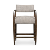 Featuring Waldon Counter Stool by Four Hands at Amethyst Home. Slim, sculptural style with this Waldon Counter Stool. Angular framing features a mix of bronze-finished metal and solid rubberwood, for a forward-thinking feel. Textural linen-blend seating adopts an invitingly neutral grey hue to move freely between spaces and styles.
Size: 23.25"W x 24.50"L.  Amethyst Home provides interior design, new home construction design consulting, vintage area rugs, and lighting in the Alpharetta metro area.