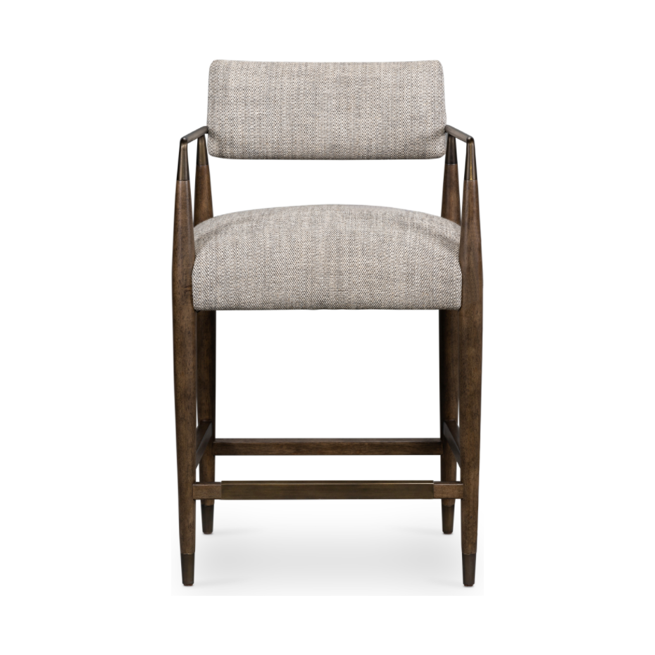 Featuring Waldon Counter Stool by Four Hands at Amethyst Home. Slim, sculptural style with this Waldon Counter Stool. Angular framing features a mix of bronze-finished metal and solid rubberwood, for a forward-thinking feel. Textural linen-blend seating adopts an invitingly neutral grey hue to move freely between spaces and styles.
Size: 23.25"W x 24.50"L.  Amethyst Home provides interior design, new home construction design consulting, vintage area rugs, and lighting in the Alpharetta metro area.