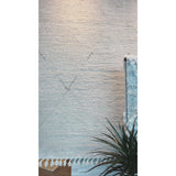 Featuring Alpine Manesa Hand-Knotted  Rug by Jaipur Living at Amethyst Home. Inspired by textiles from the Tullu region in Morocco, the Alpine Manesa rug brings texture and versatility to both global and modern spaces. Crafted of natural wool, the hand-knotted Alpine Manesa rug features a plush, ridged feel and an erased, asymmetrical trellis design in cream.  Amethyst Home provides interior design, new home construction design consulting, vintage area rugs, and lighting in the Houston metro area.