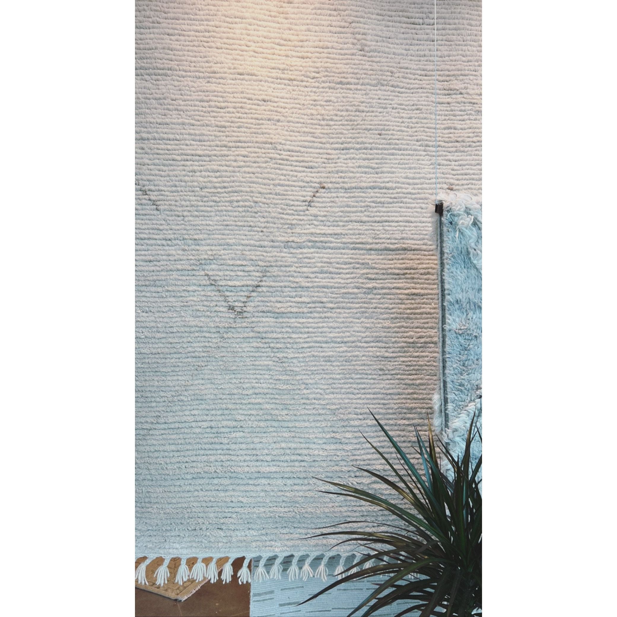 Featuring Alpine Manesa Hand-Knotted  Rug by Jaipur Living at Amethyst Home. Inspired by textiles from the Tullu region in Morocco, the Alpine Manesa rug brings texture and versatility to both global and modern spaces. Crafted of natural wool, the hand-knotted Alpine Manesa rug features a plush, ridged feel and an erased, asymmetrical trellis design in cream.  Amethyst Home provides interior design, new home construction design consulting, vintage area rugs, and lighting in the Houston metro area.