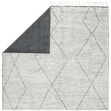 Featuring Alpine Ammil Hand-Knotted Rug by Jaipur Living at Amethyst Home. Inspired by textiles from the Tullu region in Morocco, the Alpine Ammil rug brings texture and versatility to both global and modern spaces. Crafted of natural wool, the hand-knotted Alpine Ammil rug features a plush, ridged feel and an asymmetrical trellis design in cream and blac.  Amethyst Home provides interior design, new home construction design consulting, vintage area rugs, and lighting in the Des Moines metro area.