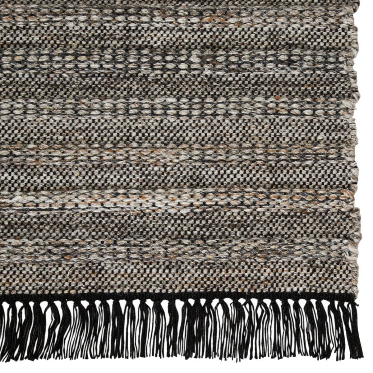 Featuring Castillo Torre Rug - Jet Black by Jaipur Living at Amethyst Home. The handwoven Castillo Torre Area Rug - Jet Black features a soft feel and relaxed, versatile style. The Torre area rug showcases a rich blend of black, gray, and rust tan tones for a grounding, neutral look. Crafted of PET yarn, or recycled plastic, this durable and textured rug bring.  Amethyst Home provides interior design, new home construction design consulting, vintage area rugs, and lighting in the Miami metro area.