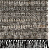 Featuring Castillo Torre Rug - Jet Black by Jaipur Living at Amethyst Home. The handwoven Castillo Torre Area Rug - Jet Black features a soft feel and relaxed, versatile style. The Torre area rug showcases a rich blend of black, gray, and rust tan tones for a grounding, neutral look. Crafted of PET yarn, or recycled plastic, this durable and textured rug bring.  Amethyst Home provides interior design, new home construction design consulting, vintage area rugs, and lighting in the Miami metro area.