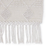 Featuring Cosette Esma Rug by Jaipur Living at Amethyst Home. The handwoven Cosette Esma Area Rug features a textural feel and casual, fun style. The Esma rug showcases a boucle-style geometric design in a light and airy white colorway. Crafted of PET yarn, or recycled plastic, this chic and durable rug brings warmth and a hint of global appeal to indoor a.  Amethyst Home provides interior design, new home construction design consulting, vintage area rugs, and lighting in the Nashville metro area.