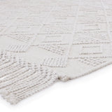 Featuring Cosette Esma Rug by Jaipur Living at Amethyst Home. The handwoven Cosette Esma Area Rug features a textural feel and casual, fun style. The Esma rug showcases a boucle-style geometric design in a light and airy white colorway. Crafted of PET yarn, or recycled plastic, this chic and durable rug brings warmth and a hint of global appeal to indoor and .  Amethyst Home provides interior design, new home construction design consulting, vintage area rugs, and lighting in the Boston metro area.