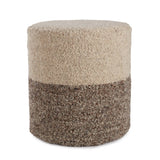 Featuring Folke Micco Partridge Pouf by Jaipur Living at Amethyst Home. Cozy and stylish in the same moment, this FFolke Micco Partridge Pouf boasts the soft and inviting texture of the on-trend shearling look. Crafted of wool, the cylinder Micco pouf showcases boucle details and a color-blocked design. The heathered brown and cream colorway offers a perfe.  Amethyst Home provides interior design, new home construction design consulting, vintage area rugs, and lighting in the Charlotte metro area.