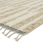 Featuring Keoka Quest Hand-Knotted Rug by Jaipur Living at Amethyst Home. The Keoka Quest Area Rug boasts a fresh take on classic Afghani hand-knotted textiles. In easy-to-deocrate tones of beige, light gray, and ivory, the light and airy colorway of the Quest rug anchors room with versatility and neutral appeal. The texture-rich wool pile features a ribb.  Amethyst Home provides interior design, new home construction design consulting, vintage area rugs, and lighting in the Washington metro area.