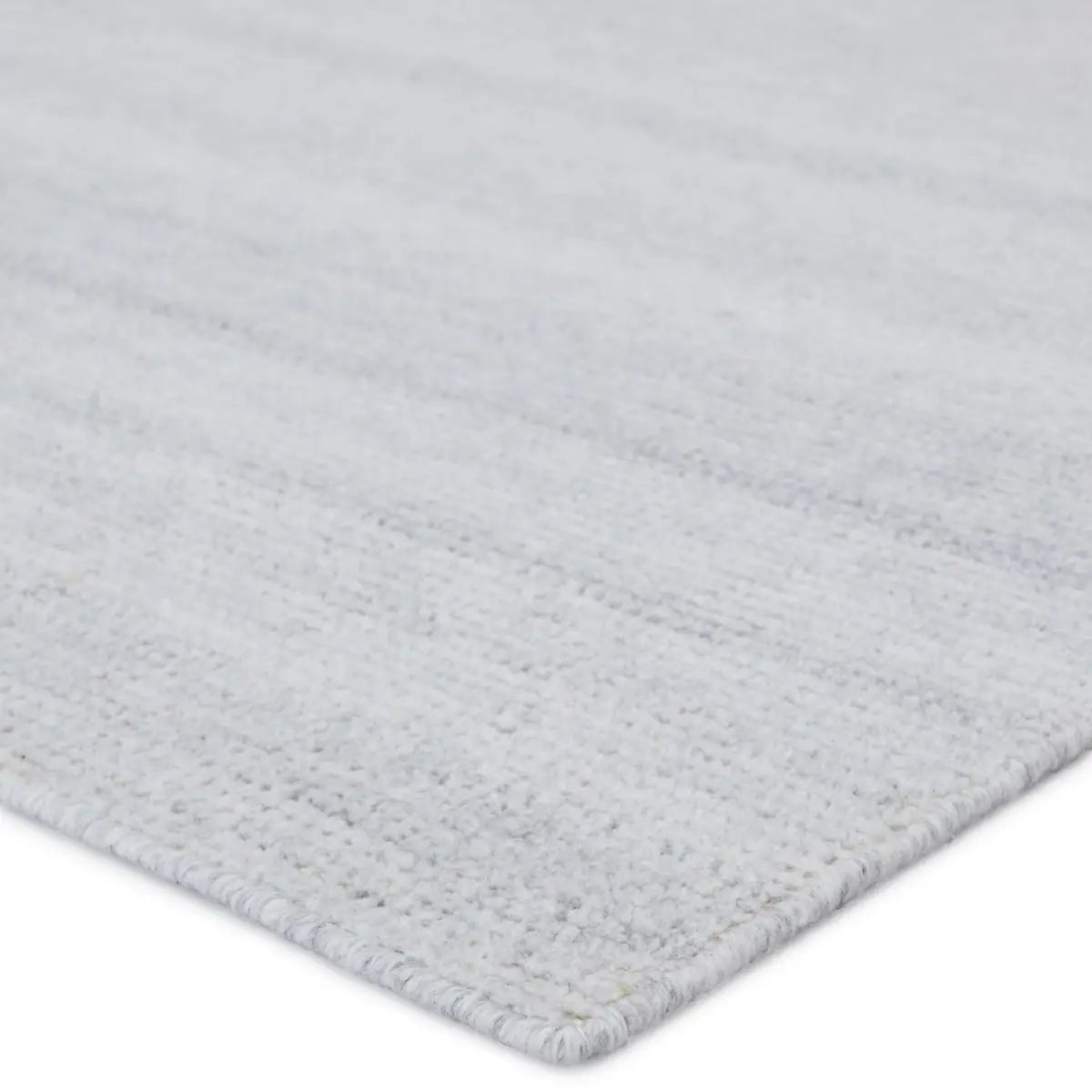 Featuring Rebecca Glacier Gray Rug by Jaipur Living at Amethyst Home. Contemporary and versatile, the eco-friendly Rebecca Glacier Gray Area Rug offers a sophisticated distressed solid design to high-traffic areas and outdoor spaces. The Limon area rug delivers a fresh accent to patios, kitchens, and dining rooms with its ultra-durable PET yarn hand-wov.  Amethyst Home provides interior design, new home construction design consulting, vintage area rugs, and lighting in the Laguna Beach metro area.