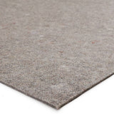 Featuring Premium Extra Plush Hold Rug Pad by Jaipur Living at Amethyst Home. Perfect for when you want a soft, plush rug pad underneath your favorite rug. With its needle-punched recycled fibers and textured rubber-backing, this floor covering ensures non-slip and durable protection that works for both hard surfaces and carpeted areas. 
Thickness: 1/4" t.  Amethyst Home provides interior design, new home construction design consulting, vintage area rugs, and lighting in the Washington metro area.