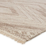 Featuring Satori Suriya Rug by Jaipur Living at Amethyst Home. The handwoven Satori Suriya Area Rug showcases dynamic, global designs with mesmerizing linear details and geometric motifs. The Suriya rug features a versatile, neutral palette and an intricate tribal and diamond pattern. The short fringe detail adds texture to this light brown and cream-colored p.  Amethyst Home provides interior design, new home construction design consulting, vintage area rugs, and lighting in the Omaha metro area.