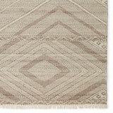Featuring Satori Suriya Rug by Jaipur Living at Amethyst Home. The handwoven Satori Suriya Area Rug showcases dynamic, global designs with mesmerizing linear details and geometric motifs. The Suriya rug features a versatile, neutral palette and an intricate tribal and diamond pattern. The short fringe detail adds texture to this light brown and cream-colored p.  Amethyst Home provides interior design, new home construction design consulting, vintage area rugs, and lighting in the Tampa metro area.