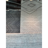 Featuring Satori Suriya Rug by Jaipur Living at Amethyst Home. The handwoven Satori Suriya Area Rug showcases dynamic, global designs with mesmerizing linear details and geometric motifs. The Suriya rug features a versatile, neutral palette and an intricate tribal and diamond pattern. The short fringe detail adds texture to this light brown and cream-colored.  Amethyst Home provides interior design, new home construction design consulting, vintage area rugs, and lighting in the Houston metro area.