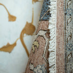 Featuring Someplace in Time Pendulum Hand-Knotted Rug by Jaipur Living at Amethyst Home. Whimsical colorways combine with the opulent detail of a traditional-inspired pattern; the Someplace in Time Pendulum Area Rug represents nostalgia and progression, heritage and the contemporary. In neutral tones of tan, beige, and gray, the inviting Pendulum rug ground s.  Amethyst Home provides interior design, new home construction design consulting, vintage area rugs, and lighting in the Dallas metro area.