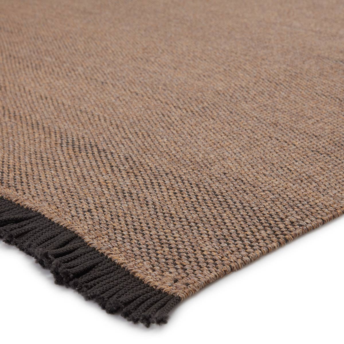 Featuring Sonder Savvy Rug by Jaipur Living at Amethyst Home. The performance-driven Sonder Savvy Area Rug offers a solid, basic design with natural-inspired texture that works for both indoor and outdoor spaces. The handwoven Savvy rug features deep, earthy tones of tan and black for the perfect neutral accent. This rug features a durable, easy-to-clean poly.  Amethyst Home provides interior design, new home construction design consulting, vintage area rugs, and lighting in the Dallas metro area.