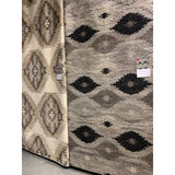 Featuring Akina Grey/Charcoal Rug by Loloi at Amethyst Home. Hand woven in India, the Akina Grey/Charcoal rug sets a rugged and worldly foundation. Each piece is deliberately crafted with textural highs and lows, accentuating the all-over geometric pattern. And because Akina is woven of 100% wool, each piece is naturally durable and fitting for your most.  Amethyst Home provides interior design, new home construction design consulting, vintage area rugs, and lighting in the Kansas City metro area.