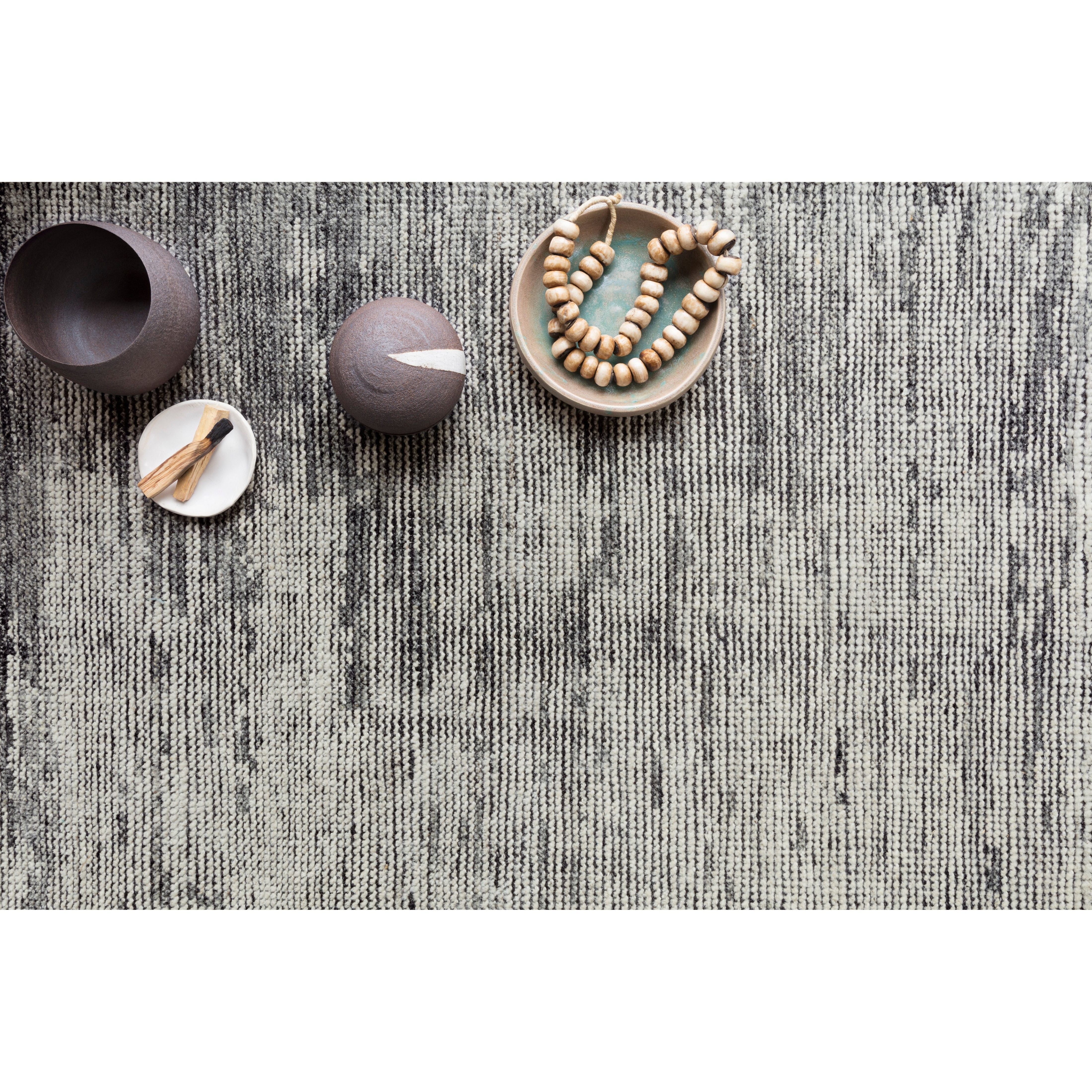 Featuring Amara Silver/Dark Grey Hand-Knotted Rug by Loloi at Amethyst Home. Hand-knotted in India of 100% wool, the Amara Silver/Dark Grey Rug creates a casual yet refined vibe with high-end appeal. Showcase in your bedroom, living room, entryway, or other high-traffic area of your home.
Hand Knotted100% WoolAMM-02 Silver/Dark Grey
Clean spills immediate.  Amethyst Home provides interior design, new home construction design consulting, vintage area rugs, and lighting in the Des Moines metro area.