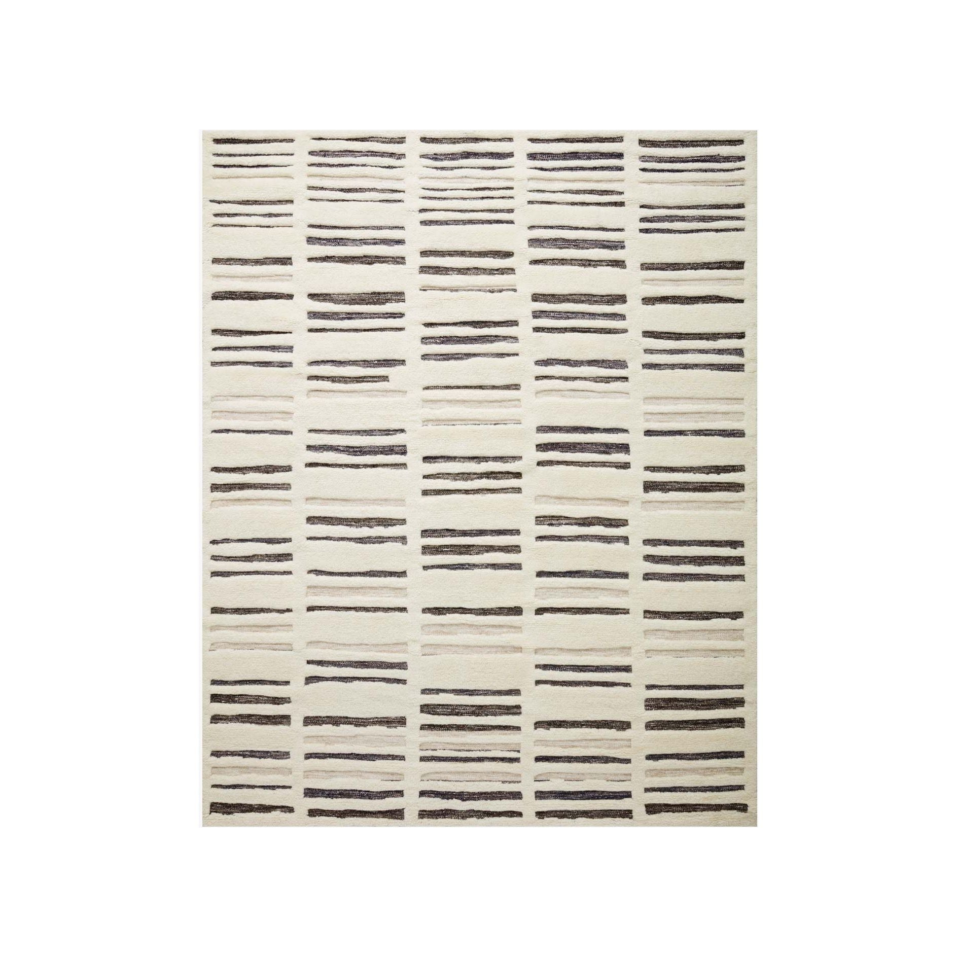 Featuring Bennett Ivory / Charcoal Hand-Knotted Rug by Loloi at Amethyst Home. Dimensional yet soft, the Bennett Ivory / Charcoal Area Rug is hand-knotted of wool, viscose and polyester in India. Featuring a new carve like high-low pile, Bennett has an ivory base with abstract tonal designs. Plus, it's plush underfoot -- a great choice for your office, .  Amethyst Home provides interior design, new home construction design consulting, vintage area rugs, and lighting in the Laguna Beach metro area.