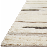 Featuring Bennett Ivory / Bark Hand-Knotted Rug by Loloi at Amethyst Home. Dimensional yet soft, the Bennett Ivory / Bark Area Rug is hand-knotted of wool, viscose and polyester in India. Featuring a new carve like high-low pile, Bennett has an ivory base with abstract tonal designs. Plus, it's plush underfoot-- a great choice for your office, bedroom, or .  Amethyst Home provides interior design, new home construction design consulting, vintage area rugs, and lighting in the San Diego metro area.