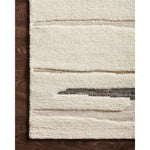 Featuring Bennett Ivory / Bark Hand-Knotted Rug by Loloi at Amethyst Home. Dimensional yet soft, the Bennett Ivory / Bark Area Rug is hand-knotted of wool, viscose and polyester in India. Featuring a new carve like high-low pile, Bennett has an ivory base with abstract tonal designs. Plus, it's plush underfoot-- a great choice for your office, bedroom, o.  Amethyst Home provides interior design, new home construction design consulting, vintage area rugs, and lighting in the Los Angeles metro area.
