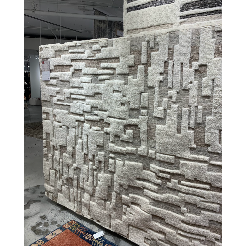 Featuring Bennett Ivory / Taupe Hand-Knotted Rug by Loloi at Amethyst Home. Dimensional yet soft, the Bennett Ivory / Taupe Area Rug is hand-knotted of wool, viscose and polyester in India. Featuring a new carve like high-low pile, Bennett has an ivory base with abstract tonal designs. Plus, it's plush underfoot-- a great choice for your office, bedroom, .  Amethyst Home provides interior design, new home construction design consulting, vintage area rugs, and lighting in the Scottsdale metro area.