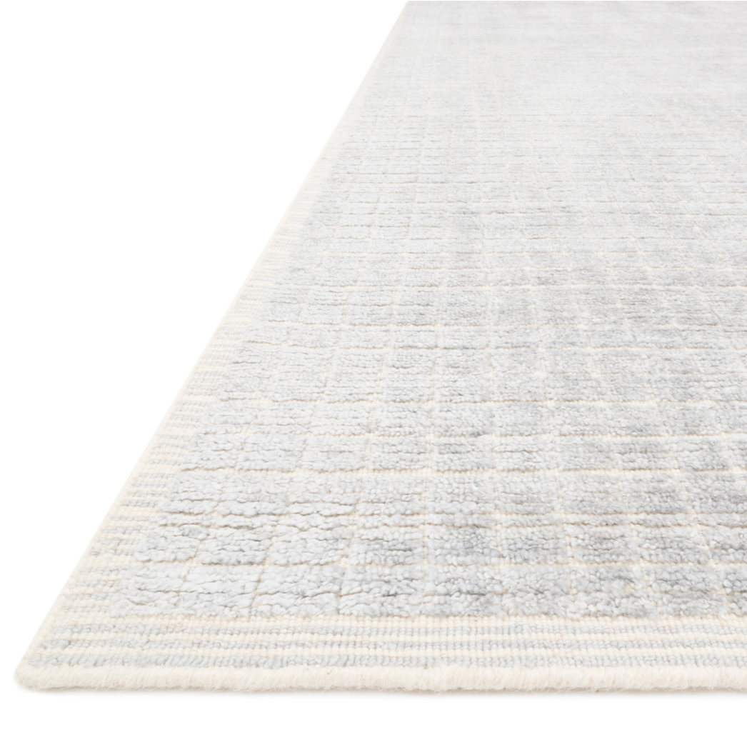 Featuring Beverly Silver/Sky Rug by Loloi at Amethyst Home. Modern and refined, the Beverly Silver/Sky rug from Loloi is hand-loomed by master artisans of viscose and wool pile. Clean lines and minimalist hues allow you to layer Beverly into any room.
Hand Loomed68% Viscose | 32% WoolBEV-01 Silver / Sky
Check out the entire Beverly rug collection below!
Lo.  Amethyst Home provides interior design, new home construction design consulting, vintage area rugs, and lighting in the Charlotte metro area.