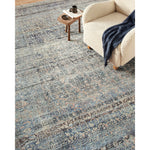 Featuring Billie Amber Lewis x Loloi Denim / Blush Rug by Loloi at Amethyst Home. Touting richly saturated colors and a distressed pattern, the Billie Collection captures the look of a well-worn antique rug at a remarkable value. Reminiscent of one-of-a-kind rugs, this Amber Lewis x Loloi collection features random variations in color that render no two pieces.  Amethyst Home provides interior design, new home construction design consulting, vintage area rugs, and lighting in the Omaha metro area.