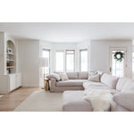 Featuring Giana Antique Ivory Rug by Loloi at Amethyst Home. Inspired by textural watercolors, the Giana Antique Ivory Area Rug combines a relaxed grid with soft variations of cream and ivory for an effortless and sophisticated look. Each area rug is hooked of 100% wool by artisans for a beautiful textural layer to your home. The soft textures of this area rug.  Amethyst Home provides interior design, new home construction design consulting, vintage area rugs, and lighting in the Omaha metro area.