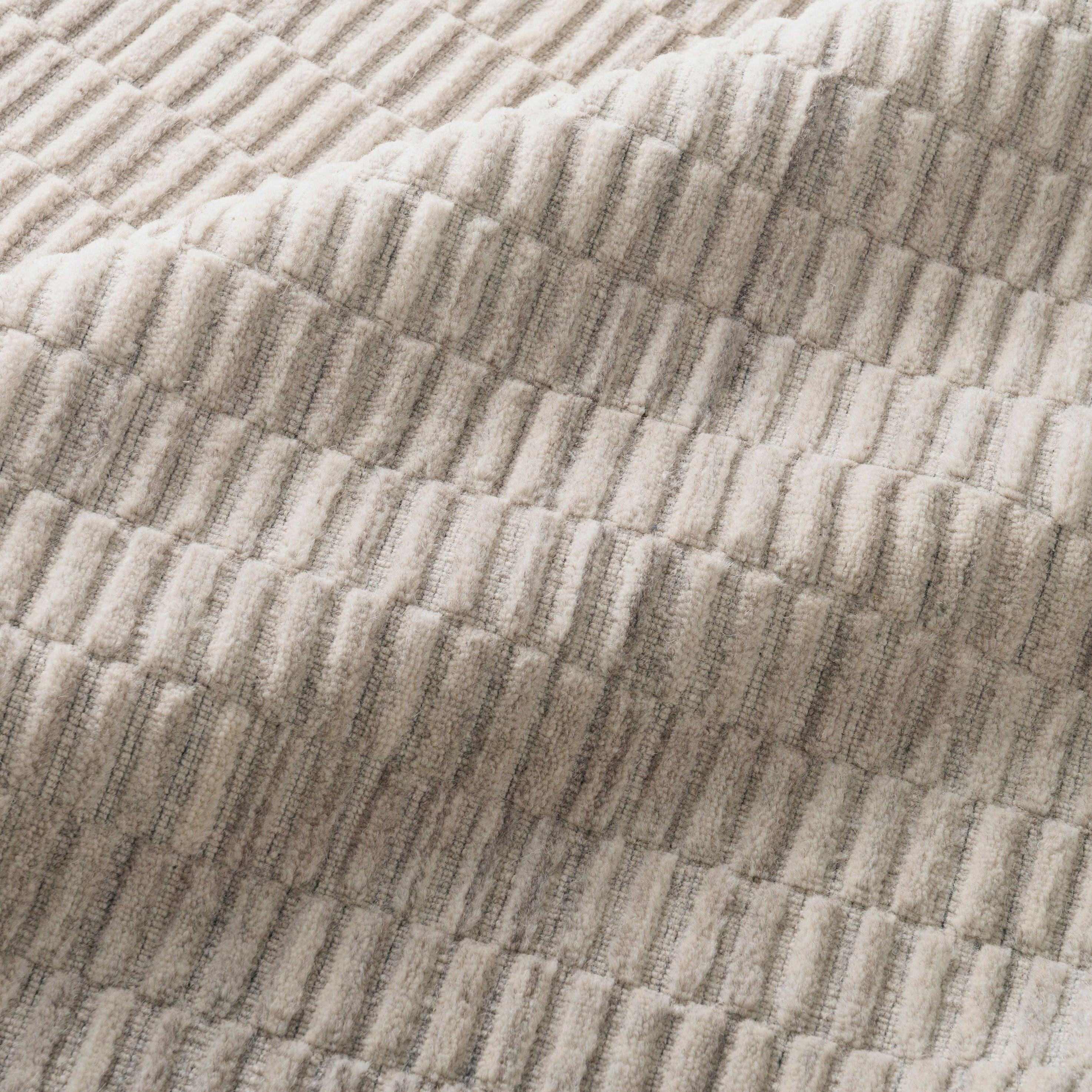 Featuring Hadley Oatmeal Rug by Loloi at Amethyst Home. Natural beauty is expressed in an understated fashion with the Hadley Collection, an eco-friendly collection of 100% undyed wool. Loom knotted in India, Hadley features an intriguing cut pile and loop combination which adds distinctive texture to these handsome and durable designs. Also, the muted colors .  Amethyst Home provides interior design, new home construction design consulting, vintage area rugs, and lighting in the Omaha metro area.