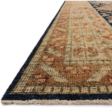 Featuring Heirloom Navy / Multi Hand-Knotted Rug by Loloi at Amethyst Home. Bring a touch of antiqued beauty into your home with our Heirloom collection. This 100% wool collection tastefully honors the art of hand knotted rugs from India. Heirloom evokes a sense of unique sophistication with its traditional Serapi rug color palettes and vintage design..  Amethyst Home provides interior design, new home construction design consulting, vintage area rugs, and lighting in the Winter Garden metro area.