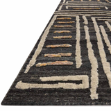 The Naomi Charcoal / Natural Area Rug is hand-knotted of wool and cotton by artisans in India. Naomi offers bold designs with earthy hues and features a high-low pile that adds depth and dimension, making each piece create the illusion of movement. A perfect rug for your living room, entryway, or other Hand Knotted 89% Wool | 11% Cotton NAO-05 Charcoal/Natural