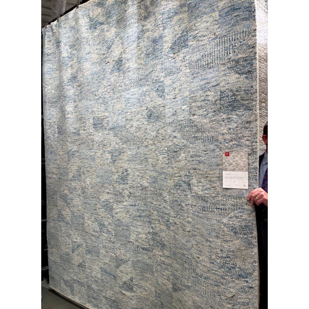 Drawing inspiration from tribal influences, the Odyssey Light BlueArea Rug combines relaxed linear pattern with a sophisticated color palette. Each Odyssey area rug, which is hand knotted of wool, viscose, and cotton, is crafted entirely by hand by master artisans in India. Hand Knotted 70% Viscose from Bamboo | 30% Wool OD-06 Light Blue
