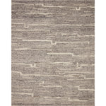 Hand-woven of 100% wool in India, the Loloi Rayan Charcoal / Ivory Area Rug, or RAY-03, sets the tone for a calming atmosphere. Each design is crafted of textural highs and lows paired with neutral tones to create and engaging understatement. The perfect rug for your bedroom, office, or other medium traffic area.