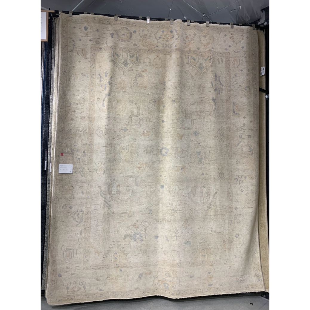 Hand knotted of 100% wool by skilled artisans, the Loloi Vincent Stone / Stone Area Rug, or VC-01, offers the look of a well-worn antique rug in a modern day color palette. Each exquisite piece undergoes a weeks-long antique washing process which fades the pattern and color beautifully.