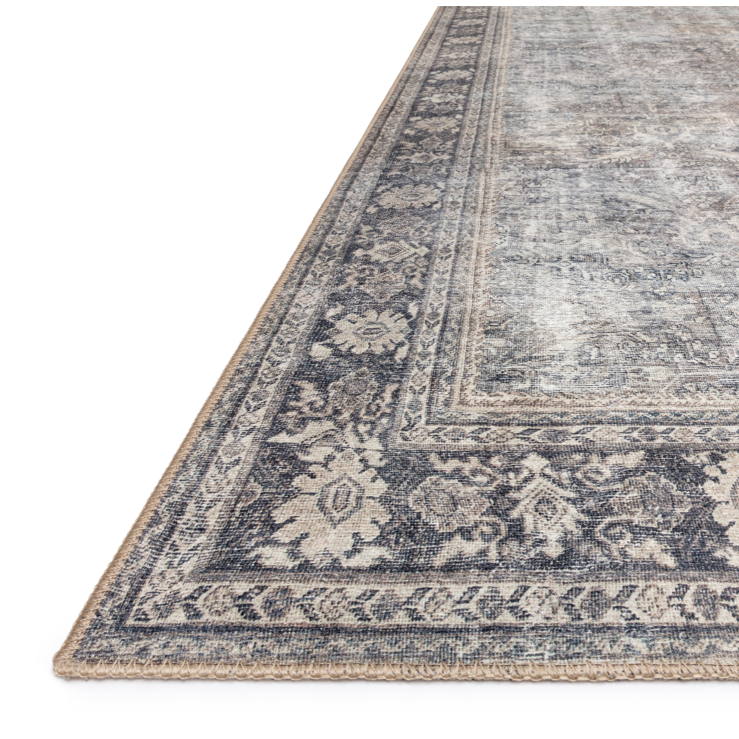 Featuring Wynter Silver / Charcoal Rug by Loloi at Amethyst Home. Old soul, new spirit. Power-loomed of 100% polyester, the Wynter Silver / Charcoal area rug showcases a one-of-a-kind vintage or antique area rug look at an affordable price. This rug brings in tones of silver, gray, blue, tan, and hints of green and ideal for high traffic areas due to the .  Amethyst Home provides interior design, new home construction design consulting, vintage area rugs, and lighting in the Des Moines metro area.