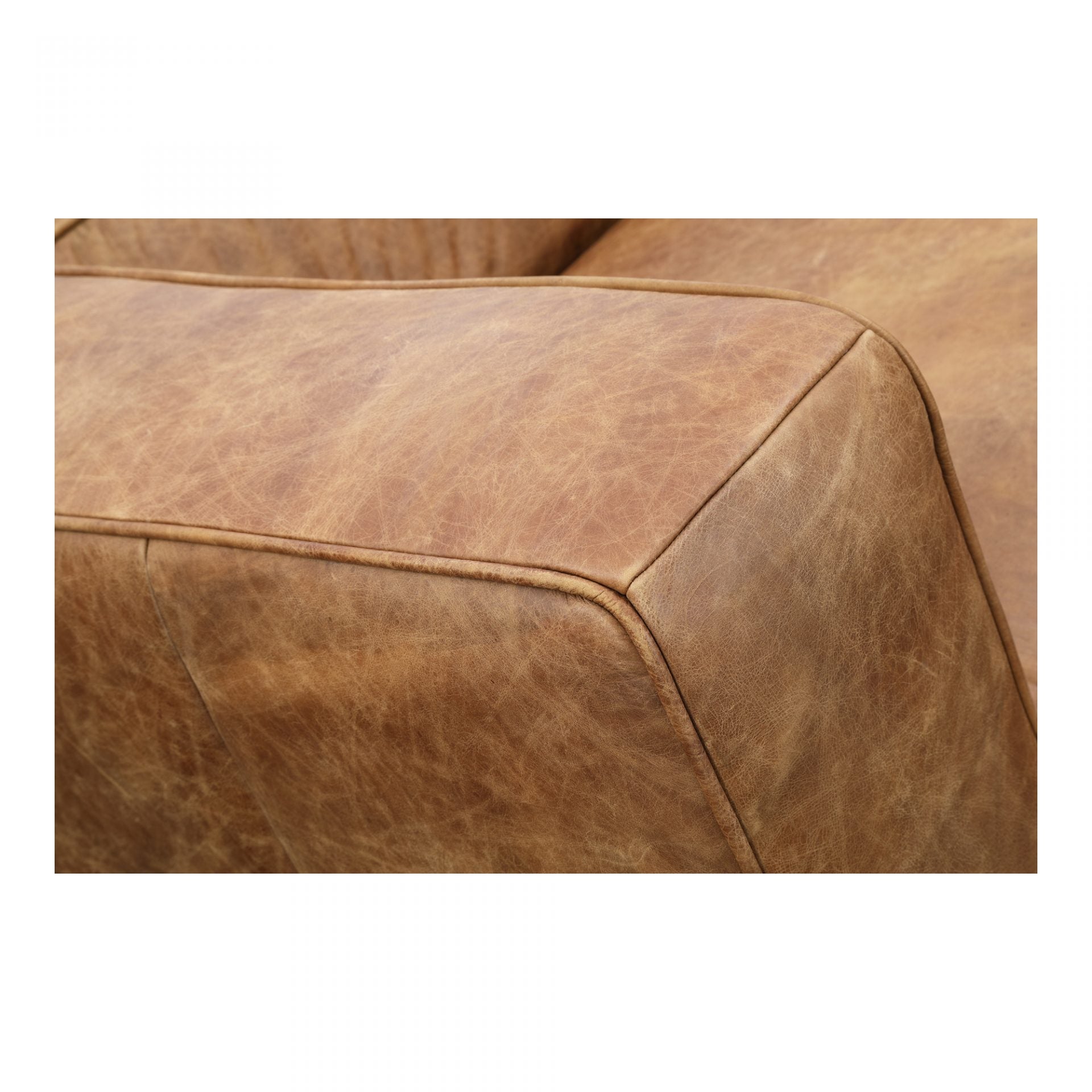The Bolton Sofa's top-grain leather and minimalistic design combine to make a great first impression. With an ample seating area that will comfortably fit four people, this top-grain leather sofa is perfect for catching up with friends or on some much-needed sleep.  Size: 101"W x 44.5"D x 27.5"H
