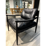 This Turner Leather Chair is a boldly blocked silhouette with swooped armrests, buttery soft top-grain leather, and solid ash wooden frame. The button-tufted cushion supports a gentle half-back, and a bonded leather support weave softens a wider seat underneath the feather + foam-filled cushion -- a comfy accent chair to add to any living room or office!  Size: 28.5"W x 30"D x 30"H