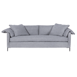 Featuring Radley Upholstered Sofa Family by Cisco Brothers at Amethyst Home. A love letter to the Radley sofa -- the metal iron feet and laid back approach to sitting is effortlessly chic. A feather cloud cushion with down filled back cushions allow for a sit that is upright yet comfortably deep. Photographed in Molino Fog. Lifestyle Photograph in Gr. Amethyst Home provides interior design, new home construction design consulting, vintage area rugs, and lighting in the Salt Lake City metro area.